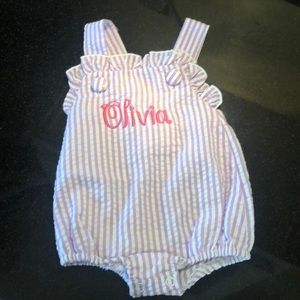 Seersucker sunsuit with “Olivia” monogrammed
